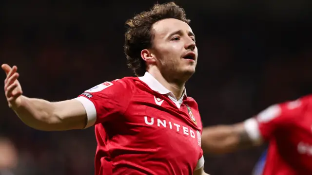 Ollie Rathbone celebrates scoring for Wrexham against Birmingham City