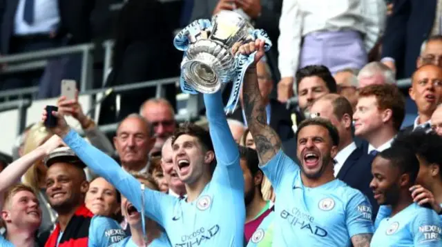 Kyle Walker lifts the FA Cup