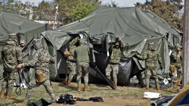 Members of the Mexican Navy build a temporary shelter in Matamoros, north-eastern Tamaulipas state. Photo: 22 January 2025