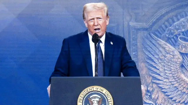 Trump behind a podium