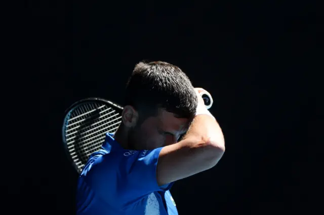 Novak Djokovic reacts