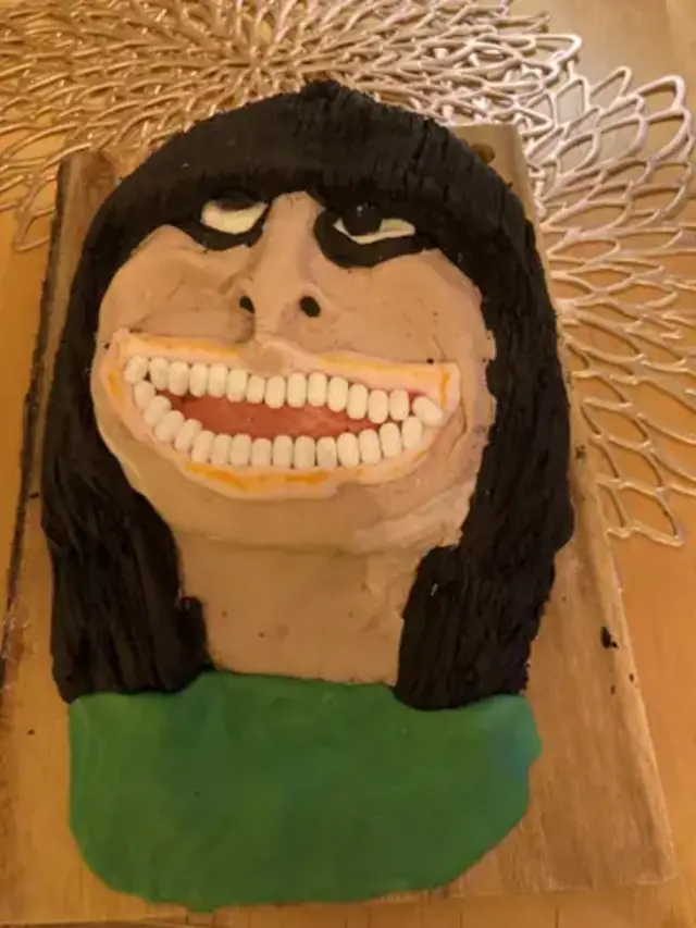 Caricature-style cake of Claudia Winkleman