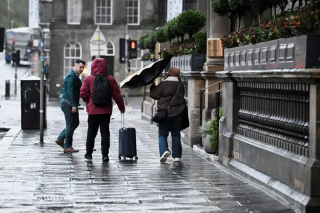 People battle against the weather as Storm Eowyn hits Edinburgh