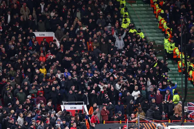 Rangers fans in home section at Old Trafford