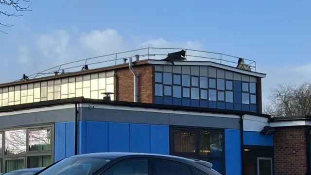 A section of one of the buildings at Egglescliffe School showing scaffolding on the roof with loose bits of material which have been damaged by the winds