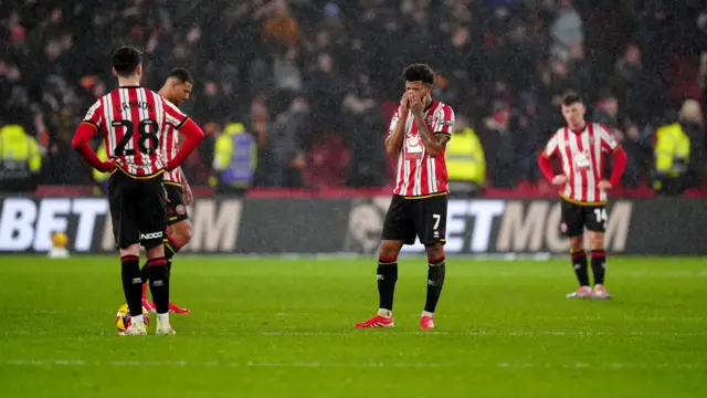 Sheffield United players look dejected