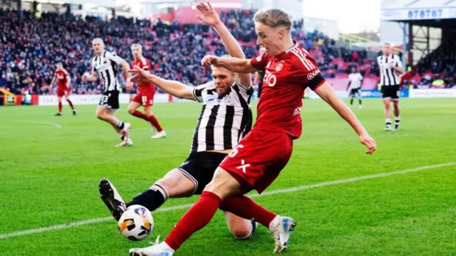 St Mirren's Marcus Fraser tackles Aberdeen's Jeppe Okkels