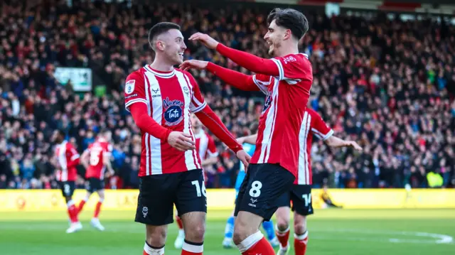 Lincoln players celebrate