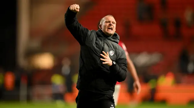 Bristol City boss Liam Manning celebrating a win