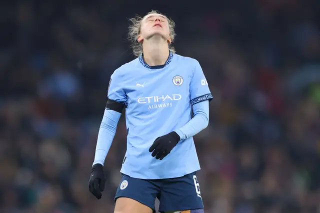 Miedema looks to the sky in frustration during the Manchester Derby