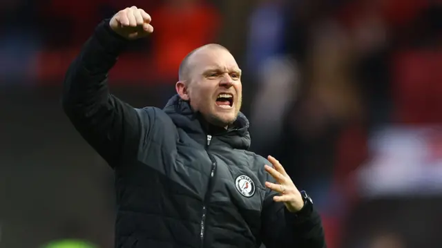 Bristol City head coach Liam Manning celebrates their win over Blackburn