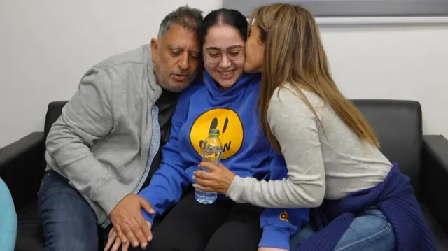 Liri Elbag with her parents