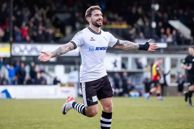 George Oakley celebrates after scoring for Ayr United against Partick Thistle