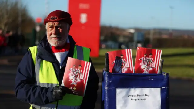 Match day programmes are seen for sale outside the stadium prior to the Sky Bet Championship match between Stoke City FC and Oxford United FC