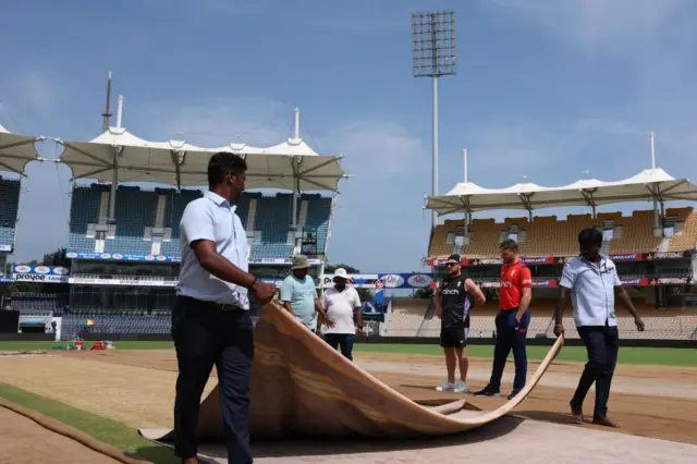 Jos Buttler and Brendon McCullum look at the pitch in Chennai