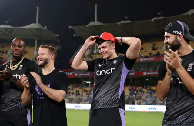 Jamie Smith presented with his cap