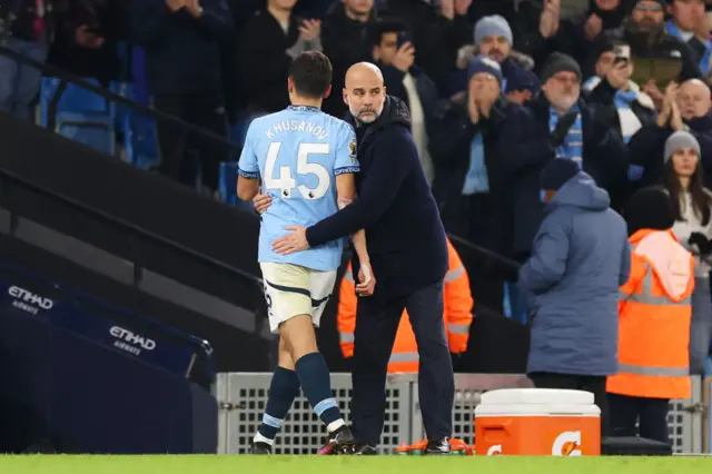 Abdukodir Khusanov and Pep Guardiola