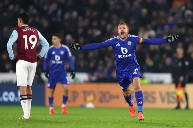 : Jamie Vardy of Leicester City celebrates scoring his sides first goal during the Premier League match between Leicester City FC and West Ham United FC.