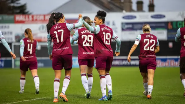 Shekiera Martinez of West Ham United celebrates with teammates after scoring to make it 1-0 during the Barclays Women's Super League match between West Ham United and Everton FC