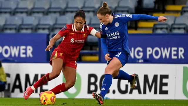 Taylor Hinds of Liverpool and CJ Bott of Leicester City in action during the WSL game at The King Power Stadium