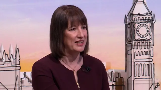 Rachel Reeves in maroon shirt sitting down during interview