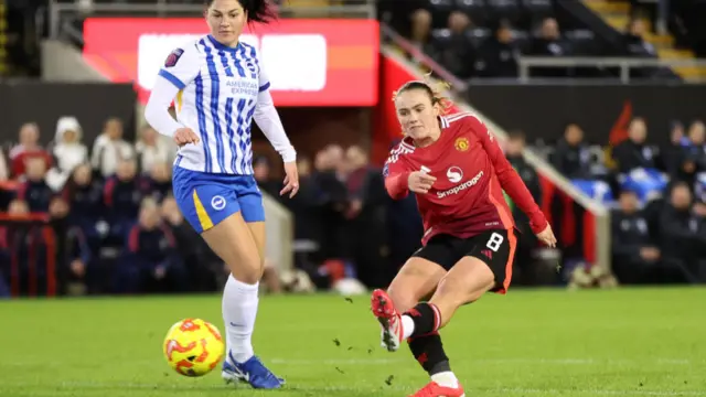 Grace Clinton of Manchester United shoots during the Barclays Women's Super League match between Manchester United and Brighton & Hove Albion at Leigh Sports Village