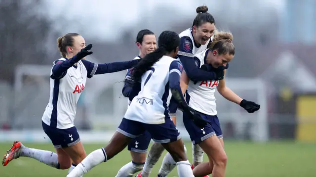 Olivia Holdt of Totenham celebrates scoring her team's third goal with team mates during the Barclays Women's Super League match between Crystal Palace and Tottenham Hotspur FC