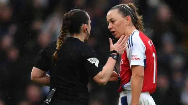 Katie McCabe of Arsenal talks to Referee, Emily Heaslip after being sent off during the Barclays Women's Super League match between Chelsea FC and Arsenal FC at Stamford Bridge