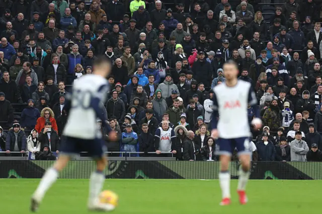 Tottenham Hotspur fans watch from the south stand