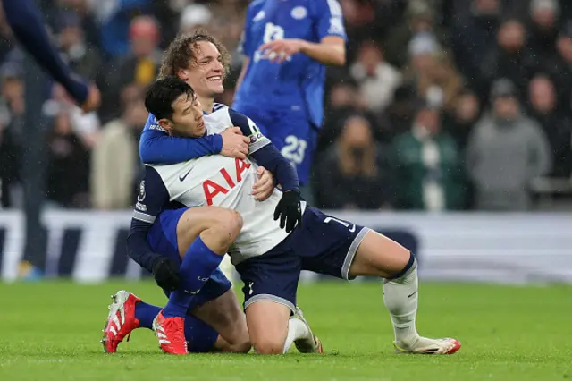 Wout Faes of Leicester City smiles as he holds Son Heung-Min