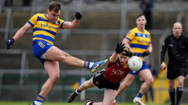 Roscommon's Enda Smith sees his shot blocked by Paddy McCarthy