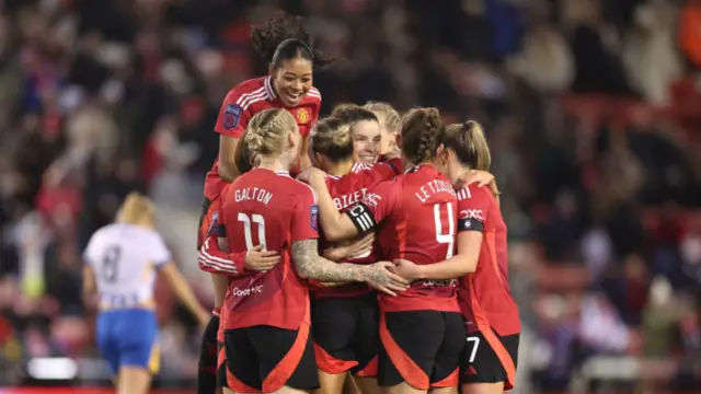 Celin Bizet Ildhusoy of Manchester United celebrates scoring her team's third goal with teammates during the Barclays Women's Super League match between Manchester United and Brighton & Hove Albion at Leigh Sports Village