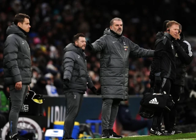 Tottenham Hotspur manager Ange Postecoglou (centre) reacts