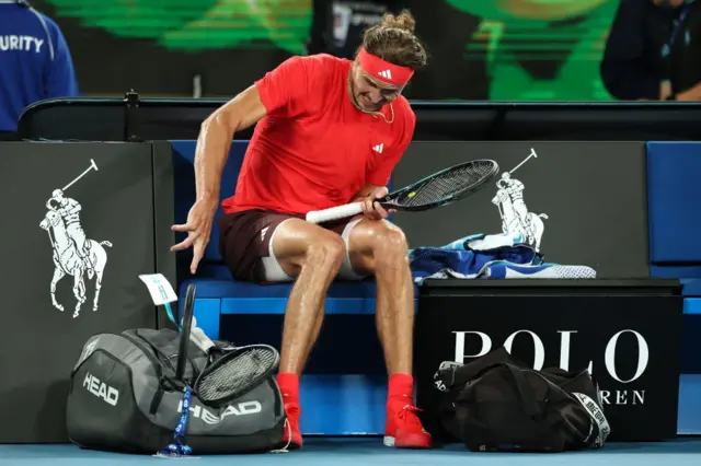 Alexander Zverev smashes his racquet