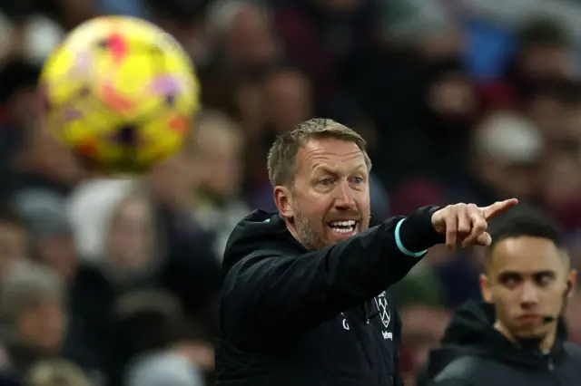 West Ham United's English head coach Graham Potter shouts instructions.