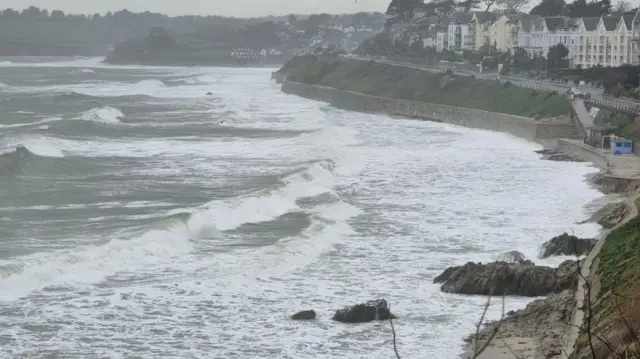 Waves hitting the shore.