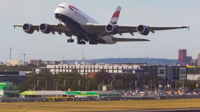 A plane taking off at Heathrow Airport