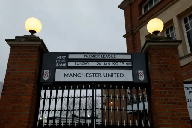 A sign outside Craven Cottage advertising the game against Manchester United