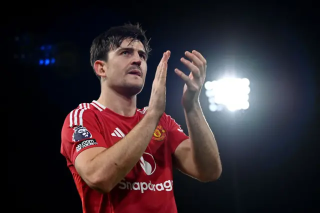 Manchester United's English defender #05 Harry Maguire reacts.