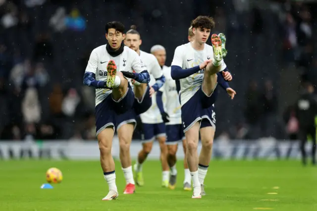 Son Heung-Min of Tottenham Hotspur warms up, with his teammates.