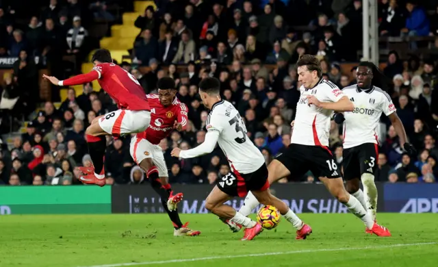 Manchester United's Amad Diallo scores a goal that was later disallowed.