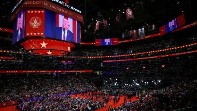 Donald Trump is shown on a screen on the inauguration day of his second Presidential term, inside Capital One, in Washington