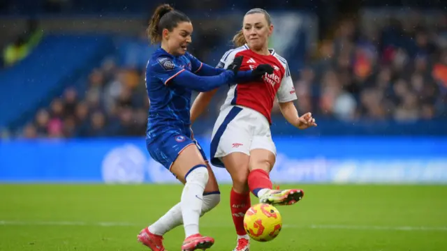 ohanna Rytting Kaneryd of Chelsea challenges Katie McCabe of Arsenal during the Barclays Women's Super League match between Chelsea FC and Arsenal FC at Stamford Bridge