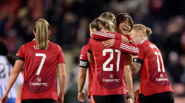 Hinata Miyazawa of Manchester United celebrates scoring her team's second goal during the Barclays Women's Super League match between Manchester United and Brighton & Hove Albion