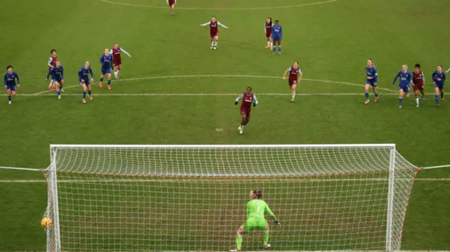 Viviane Asseyi of West Ham United scores her team's second goal from the penalty spot during the Barclays Women's Super League match between West Ham United and Everton