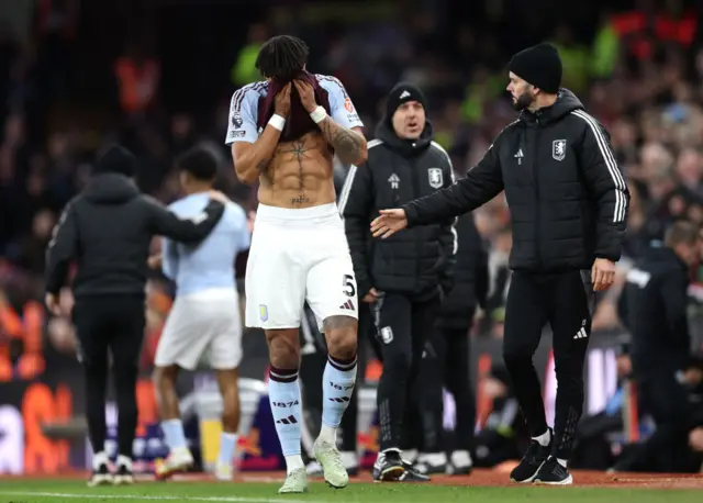 Tyrone Mings of Aston Villa looks dejected