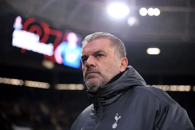 Ange Postecoglou, Manager of Tottenham Hotspur, looks on.