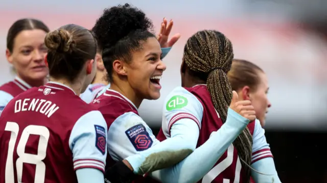 Shekiera Martinez of West Ham United celebrates scoring her team's first goal with teammates during the Barclays Women's Super League match between West Ham United and Everton