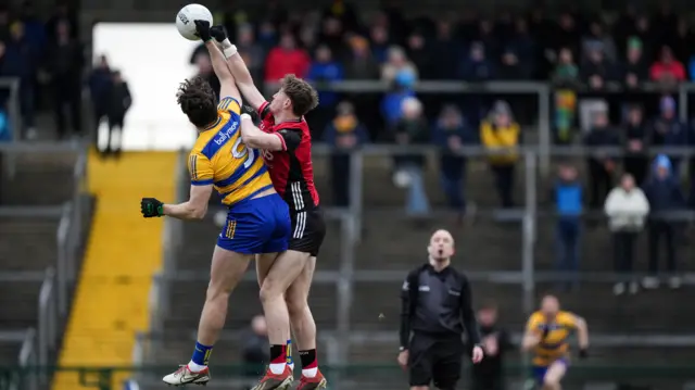 Roscommon's Keith Doyle and Ryan McEvoy battle for the high ball