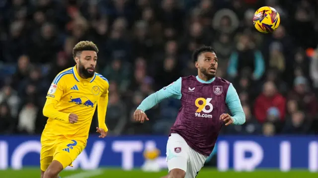 Leeds' Jayden Bogle looks to close down Burnley's Lyle Foster